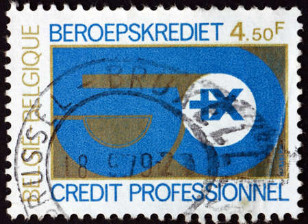 BELGIUM - CIRCA 1979: a stamp printed in Belgium dedicated to national fund for professional credit, 50th anniversary, circa 1979のeditorial素材