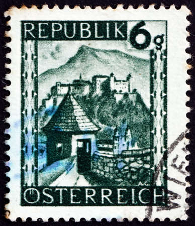 AUSTRIA - CIRCA 1945: a stamp printed in Austria shows Hohensalzburg, Salzburg Province, circa 1945のeditorial素材