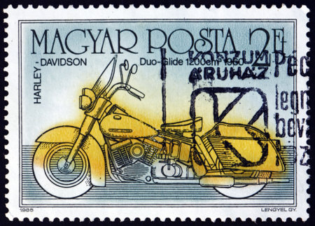 HUNGARY - CIRCA 1985: a stamp printed in Hungary shows Harley-Davidson duo-glide, from 1960, motorcycle, circa 1985のeditorial素材