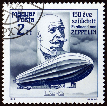 HUNGARY - CIRCA 1988: a stamp printed in Hungary shows Count Ferdinand von Zeppelin designer of dirigibles, and LZ-2 dirigible, circa 1988のeditorial素材