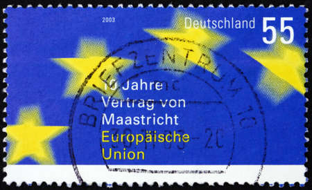 GERMANY - CIRCA 2003: a stamp printed in Germany shows stars, ratification of Maastricht Treaty, 10th anniversary, circa 2003の写真素材