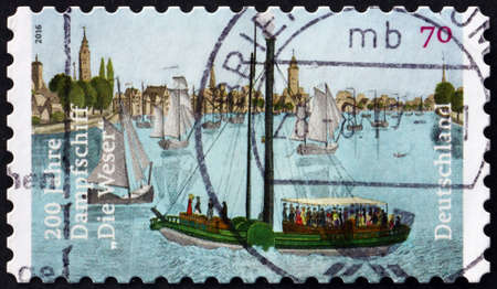 GERMANY - CIRCA 2016: a stamp printed in Germany shows river paddle steamboat Weser (around 1818), circa 2016のeditorial素材