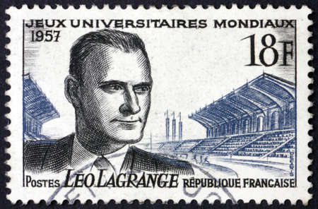 FRANCE - CIRCA 1957: a stamp printed in France shows Leo Lagrange (1900-1940), was a French Under-Secretary of State for Sports during the Popular Front (1936-1938), and Stadium, circa 1957のeditorial素材