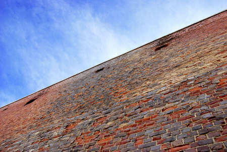 Wall from an old brick in the long termの写真素材