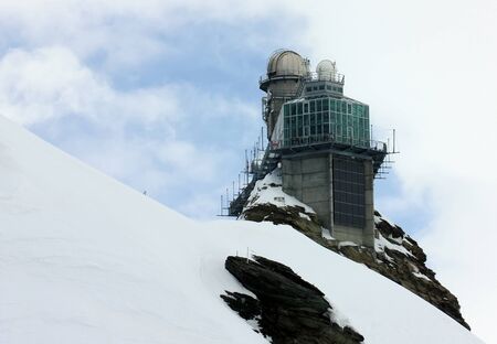 Observatory on a mountain Jungfrau at height in 3570 meterの写真素材