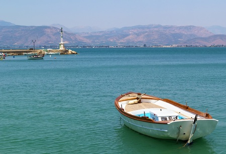 the small boat in port of the city of Nafplio, Greece