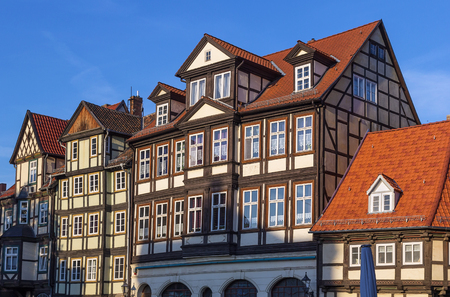 the street with half-timbered houses in Quedlinburg, Germany. In downtown a wide selection of half-timbered buildings from at least five different centuries are to be foundの写真素材