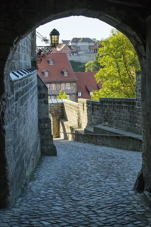 Castle in Quedlinburg settles down on the mountain and towers over the city, Germany. Gate in the castleのeditorial素材