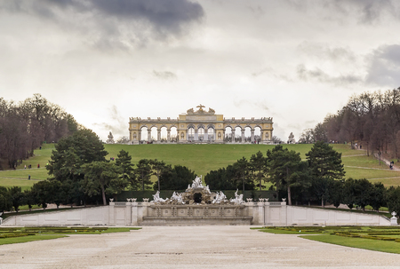 Gloriette and Neptune fountain in  Schonbrunn Palace Garden in Vienna, Austriaのeditorial素材