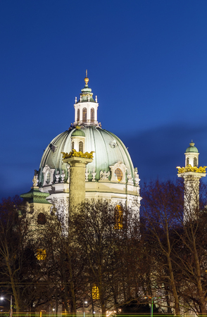 Karlskirche  (St. Charles Church) has garnered fame due to its dome and its two flanking columns of bas-reliefs, Viennaの写真素材
