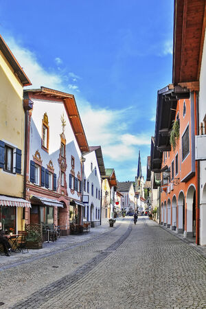 Street with typical houses in Garmisch Partenkirchen, Germanyの写真素材