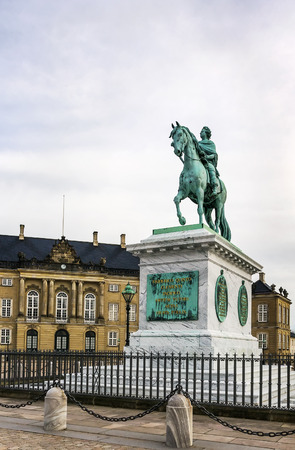 Statue of Frederick V by Jacques Francois Joseph Saly. It is located at the centre of the Amalienborg Palace Square in Copenhagen, Denmarkのeditorial素材