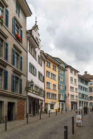 Street with historic houses in Zurich city center, Switzerlandの写真素材