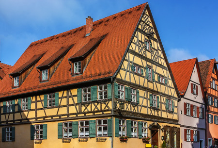 Street with historic houses in the Dinkelsbuhl city center. Dinkelsbuhl is old Franconian town, one of the best-preserved medieval urban complexes in Germany.のeditorial素材
