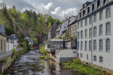 picturesque houses along the Rur River in the historic center of Monschau, Germanyのeditorial素材