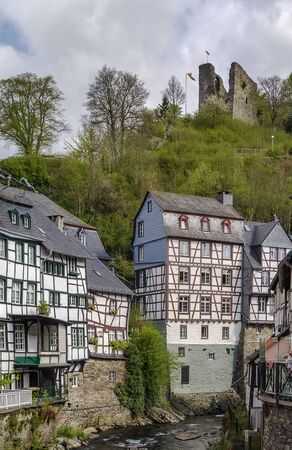 picturesque houses along the Rur River in the historic center of Monschau, Germanyのeditorial素材