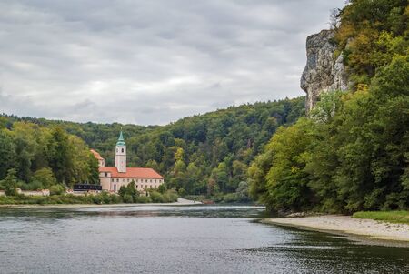 Weltenburg Abbey is a Benedictine monastery in Weltenburg near Kelheim on the Danube in Bavaria, Germany. View from riverの写真素材