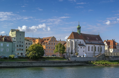 view Regensburg  with Church of St. Oswald from Danube, Germany
