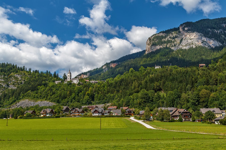 Landscape in Alps mountains with church in Purgg, Styria, Austriaの写真素材
