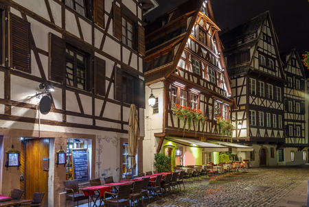Street with historical half-timbered houses in Petite France district in Strasbourg, France. Eveningの写真素材