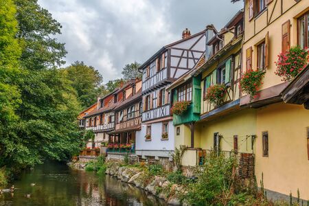 Historic houses on the embankment of Weiss river in Kaysersberg, Alsace, Franceの写真素材