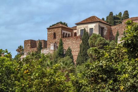 view of Alcazaba in Malaga, Spain. Alcazaba is a palatial fortification in Malaga の写真素材