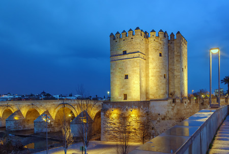 The Calahorra Tower (Spanish: Torre de la Calahorra) and Roman bridge, Cordoba, Spain. Eveningの写真素材