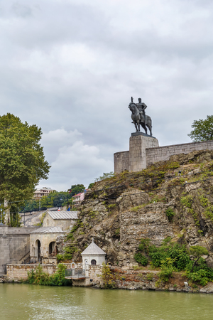 Statue of King Vakhtang Gorgasali above Kura River, Tbilisi, Georgiaの写真素材