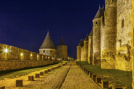 Cite de Carcassonne is a medieval citadel located in the French city of Carcassonne. Towers and wal in Eveningのeditorial素材