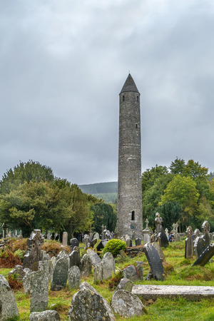 Round Tower and cemetery in Glendalough, Irelandのeditorial素材