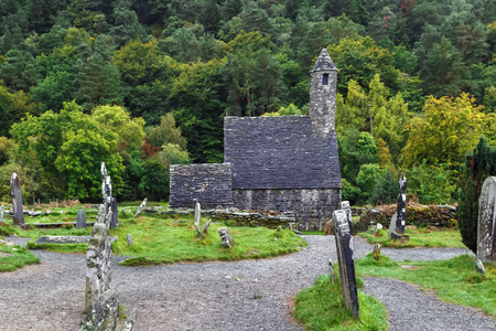 St. Kevin's Church with the Round Tower in Glendalough, Irelandの写真素材