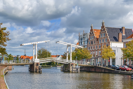View of Binnen Spaarne river with Gravestenenbrug bridge, Haarlem, Netherlandsの写真素材