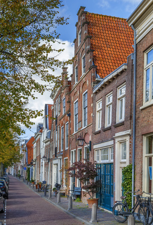 Street with historical houses in Haarlem city center, Netherlandsの写真素材