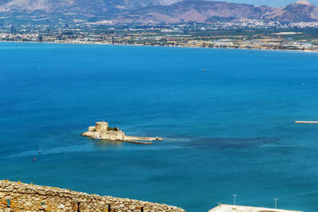 The castle of Bourtzi is located in the middle of the harbour of Nafplio, Greeceのeditorial素材