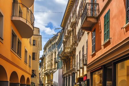 Street with historical houses in Lugano downtown, Switzerlandの写真素材