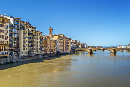 Embankment of Arno river with Ponte alle Grazie, Florence, Italyの写真素材