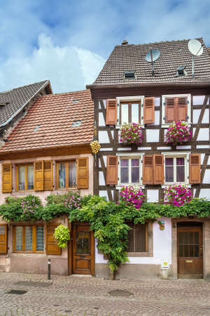 Street with historical houses in Ribeauville, Alsace, Franceのeditorial素材