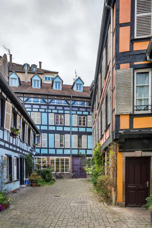 Courtyard with historical half-timbered houses in Strasbourg city center, Alsace, Franceのeditorial素材