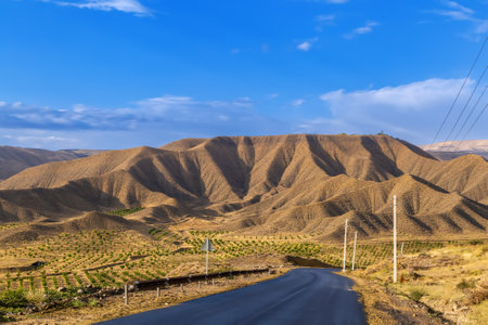 Landscape with a road in the mountains in Armeniaの写真素材