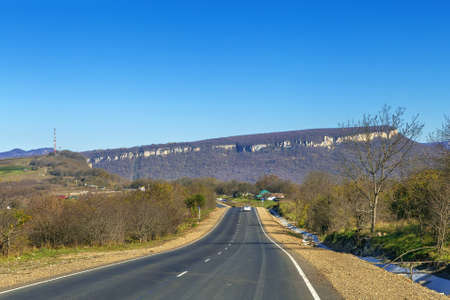 Landscape with highway and rock in Adygea, Russiaの写真素材