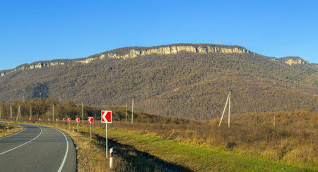 Landscape with highway and rock in Adygea, Russiaの写真素材