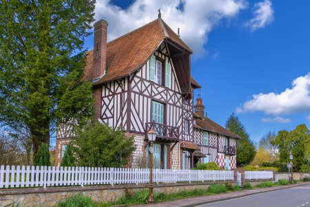 Street with historical half-timbered houses in Beuvron-en-Auge, Franceの写真素材