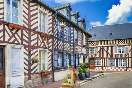 Street with historical half-timbered houses in Beuvron-en-Auge, Franceの写真素材