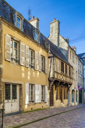 Street with historical houses in Bayeux, Franceの写真素材