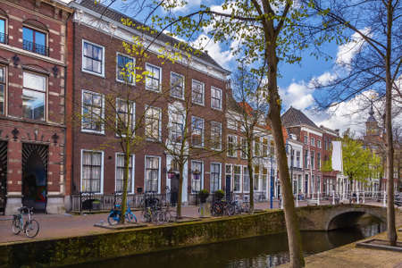 Canal embankment in Delft city center, Netherlandsの写真素材