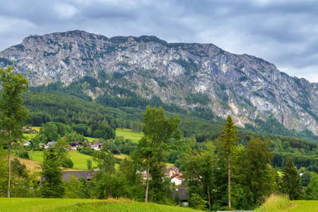 Village and rocks on the shore of lake Attersee, Austriaの写真素材