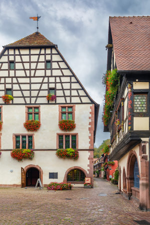 Street with historical half-timbered houses in Kaysersberg, Alsace, Franceの写真素材