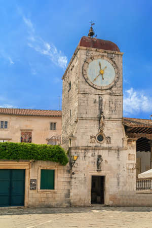 Loggia and clock tower on central square in Trogir, Croatiaの写真素材