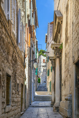 Narrow street in Sibenik old town, Croatiaの写真素材
