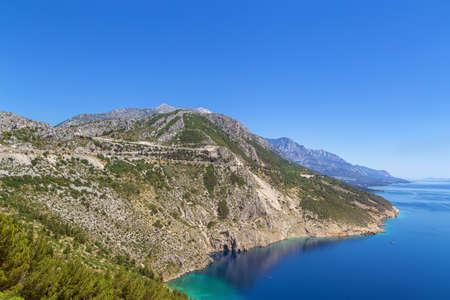 Vruja Bay is a beautiful resort located halfway between Omis and Makarska, Croatiaの写真素材
